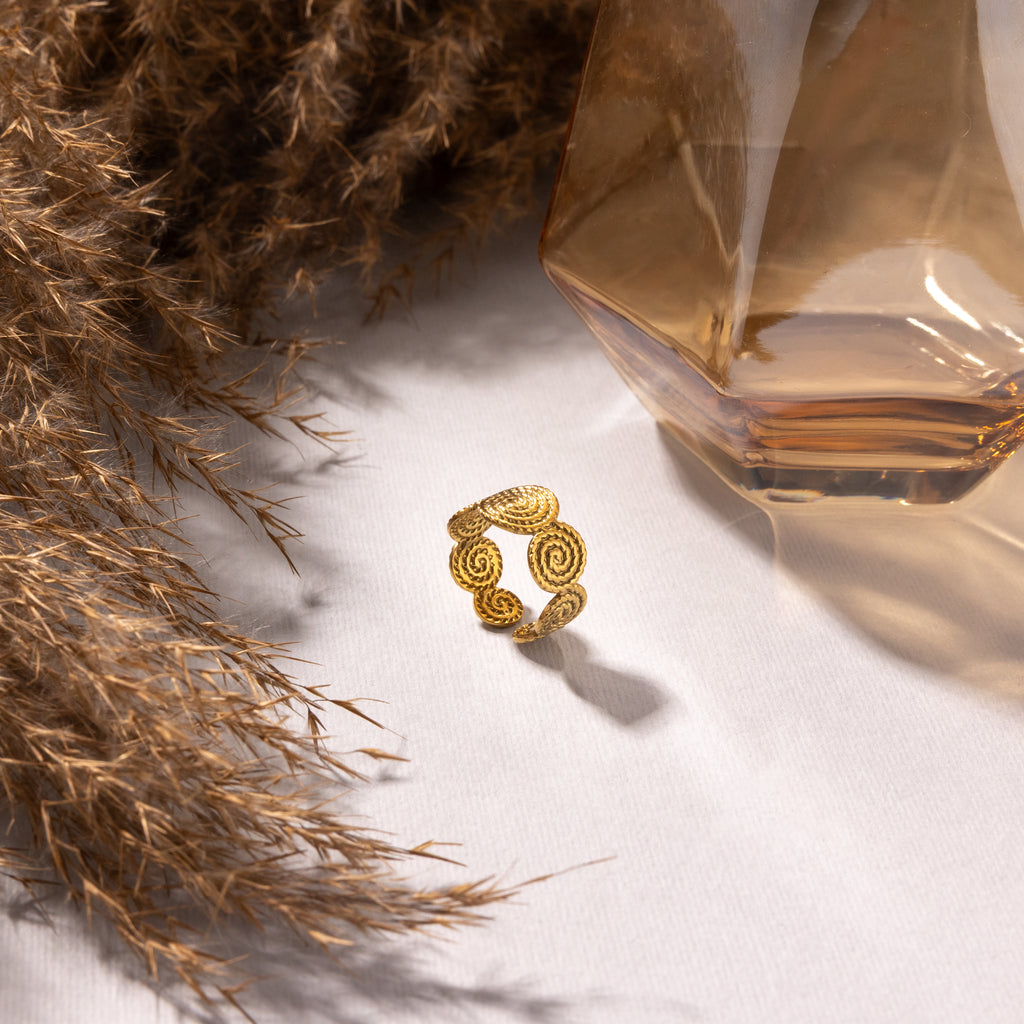 Celeste Spiral Adjustable Ring – Gold Tone